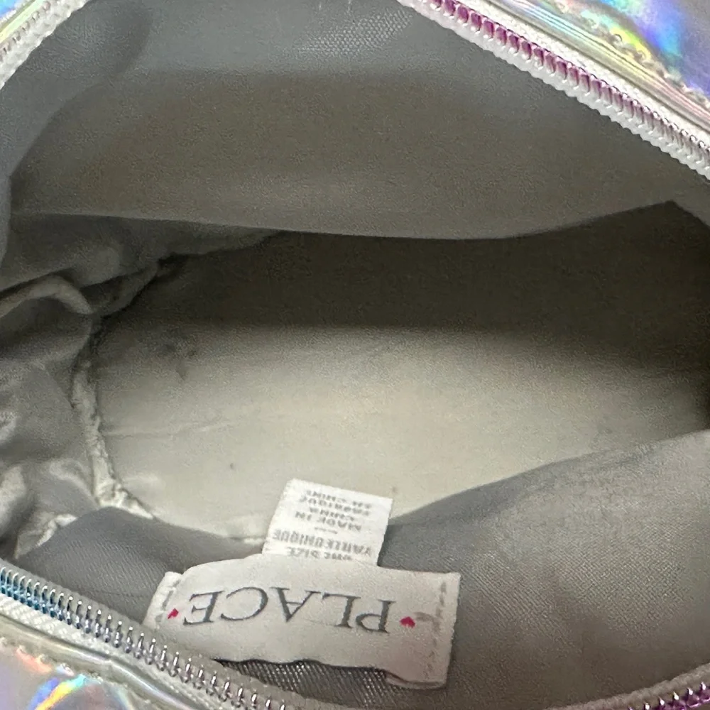Place Silver Reflective Backpack with Adjustable Straps